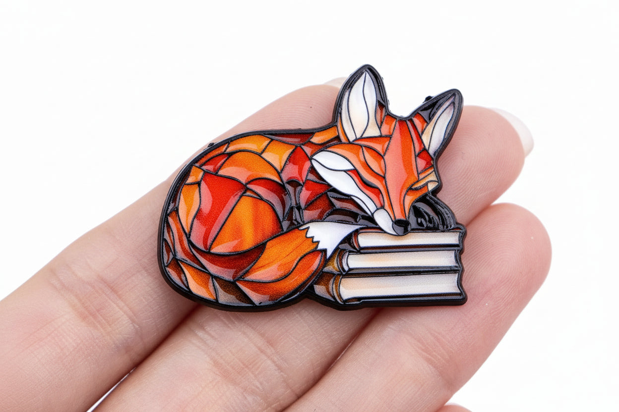 Lezende vos pin