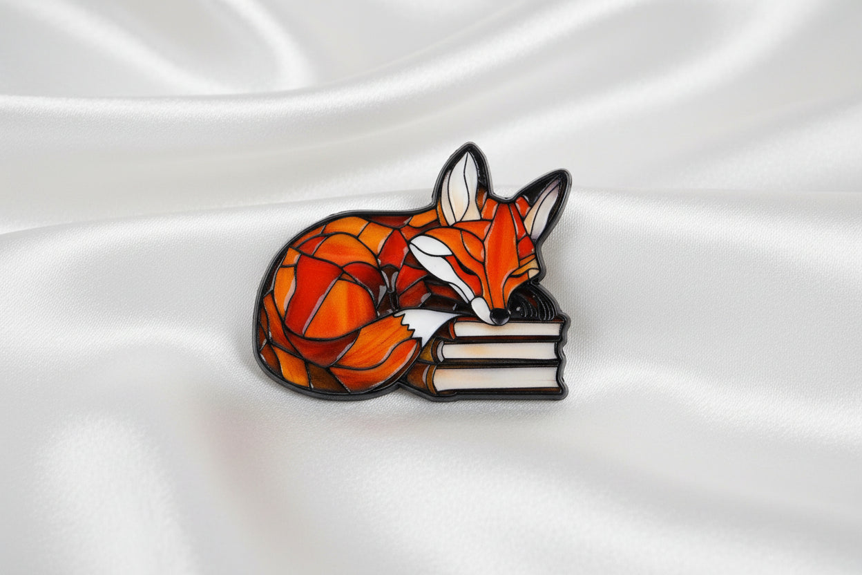 Lezende vos pin
